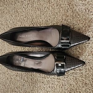 Nine West shoes. faux snake skin with buckles on the toes. Size 6